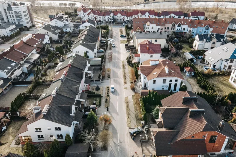 Same Street, Different Century: The Infrastructure Decisions That Divide Neighbors Online
